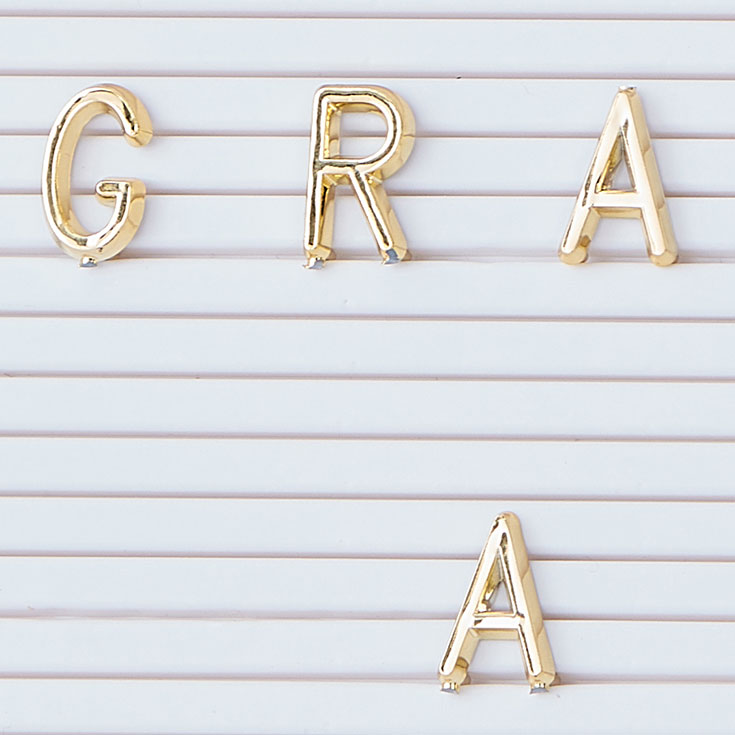 White Peg Board with Gold Letters
